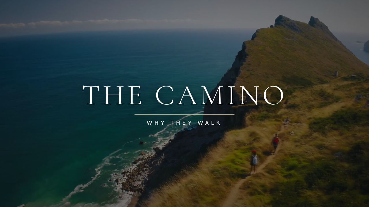 The Camino &mdash; Why They Walk documentary title card over an aerial view of a green headland meeting the sea