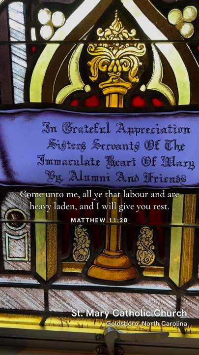 Matthew 11:28 verse card centered over a stained-glass window